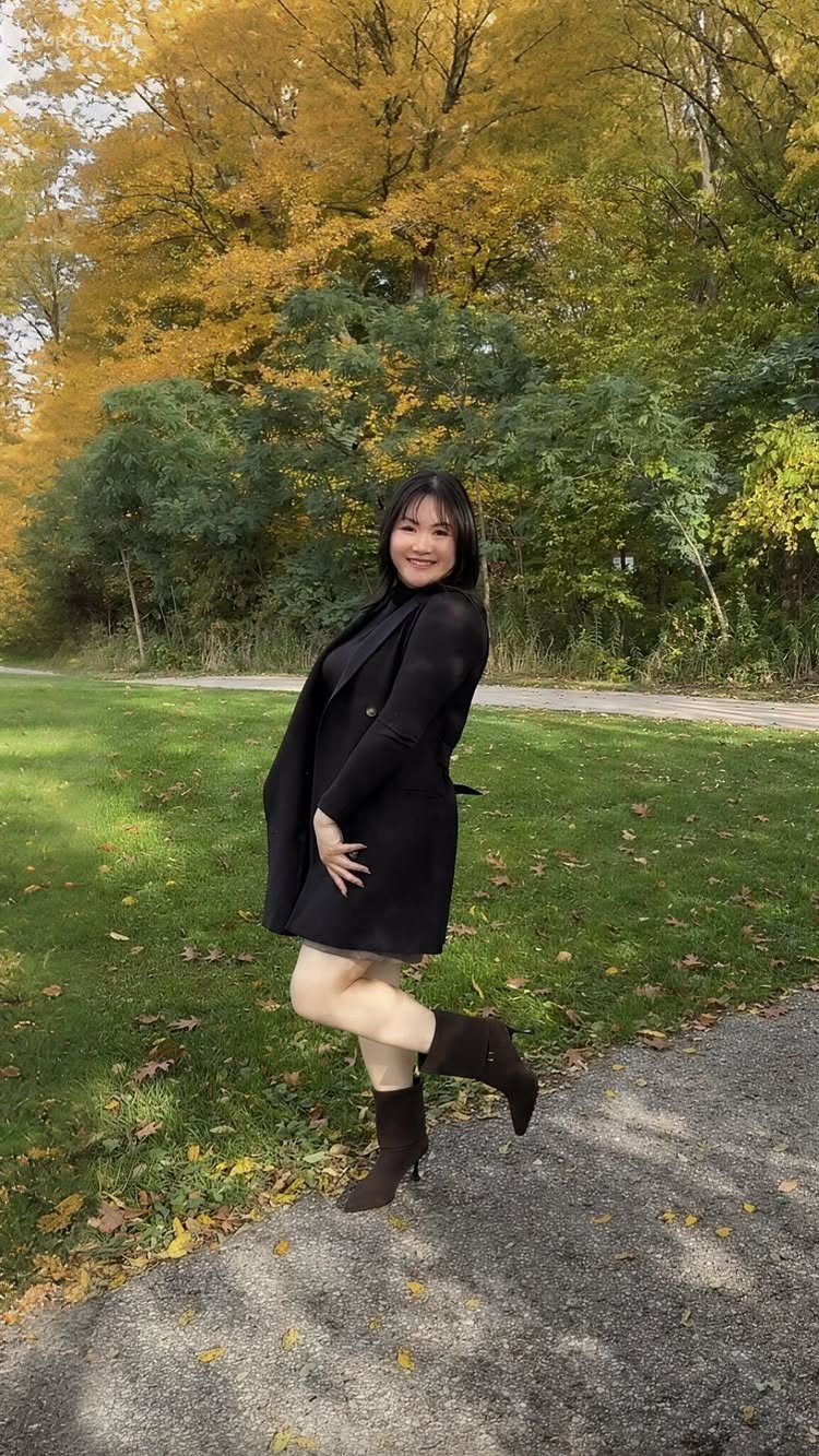 57 Degree Weather Outfit: 19 Ideas to Wear Now 8 Woman in a black blazer dress wearing dark brown suede ankle boots outdoors.