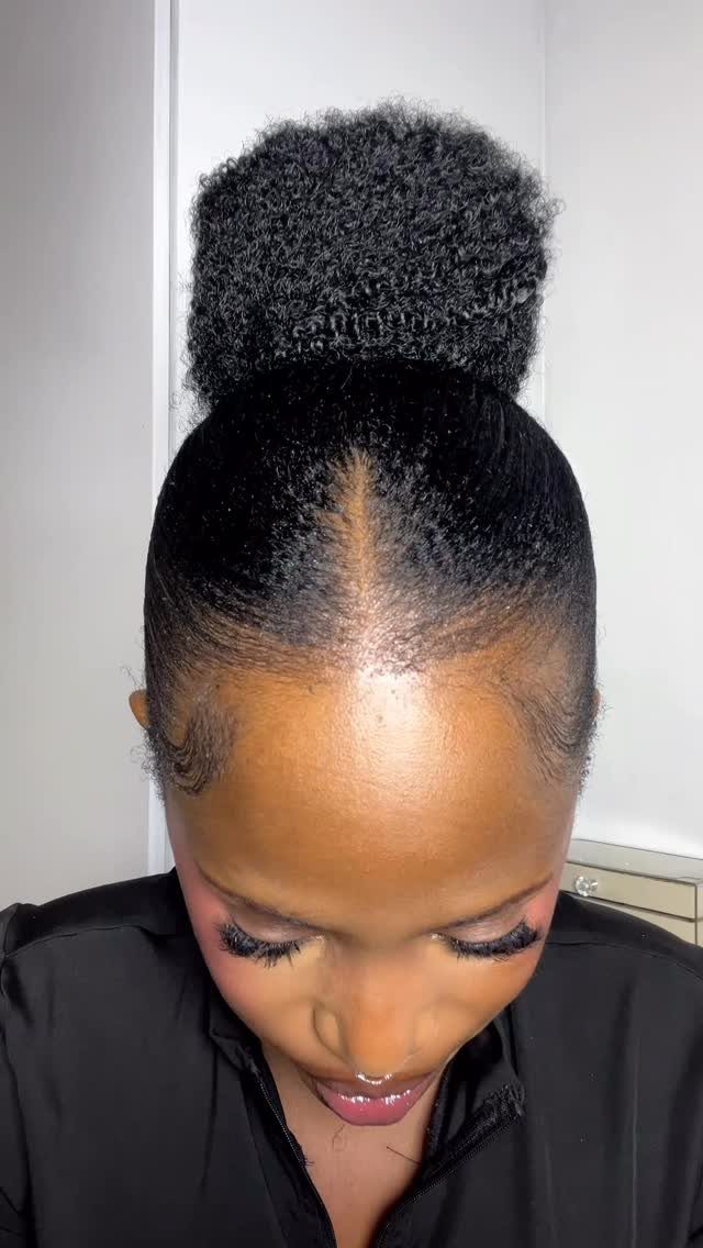 7 Back Hairstyle for Women Ideas, Braids to Buns 7 Woman with slicked-back hair and a high, voluminous curly puff ponytail.