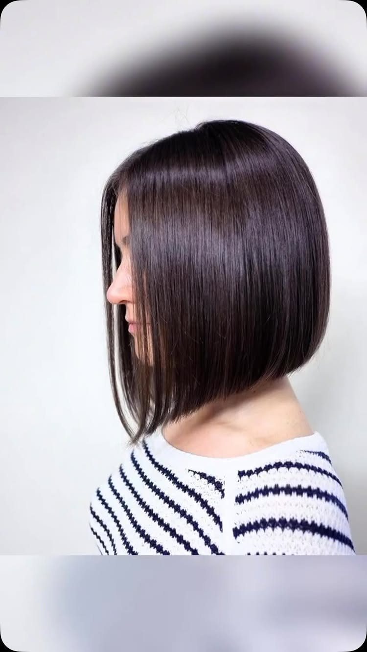 18 Bobo Hair Style Ideas, From Lob to Boxy Cuts 6 Woman with a sleek A-line bob haircut, shorter in back and longer in front.