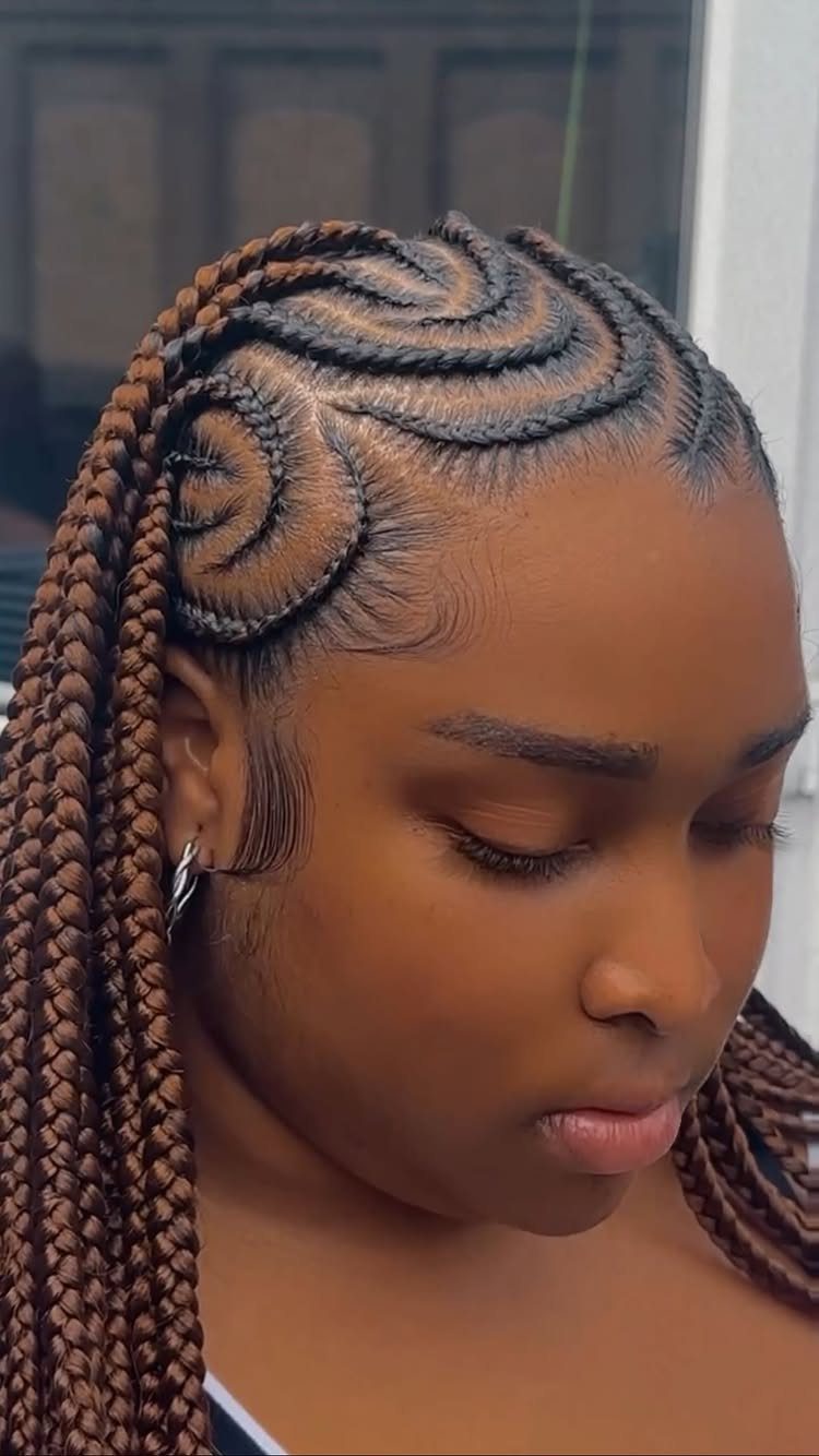 20 Braids and Women Hairstyles to Try in 2026 5 Woman with brown cornrows styled in curved patterns on her scalp.
