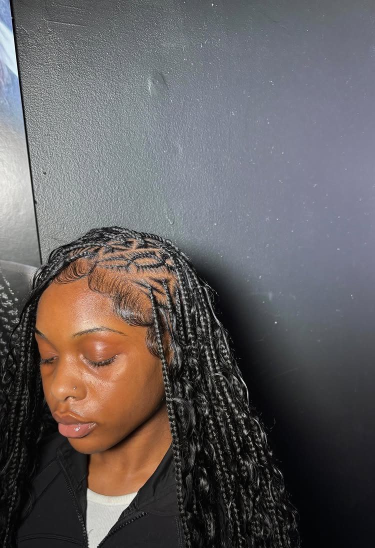 20 Braids and Women Hairstyles to Try in 2026 8 Woman with black Fulani braids featuring cornrows and long individual box plaits.
