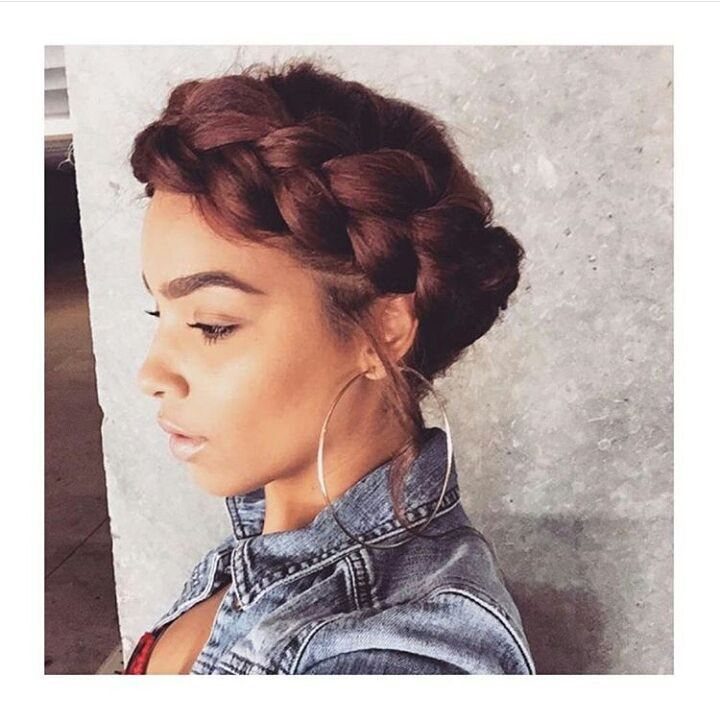 20 Braids and Women Hairstyles to Try in 2026 3 Woman with brown hair styled in a thick halo braid crown hairstyle.