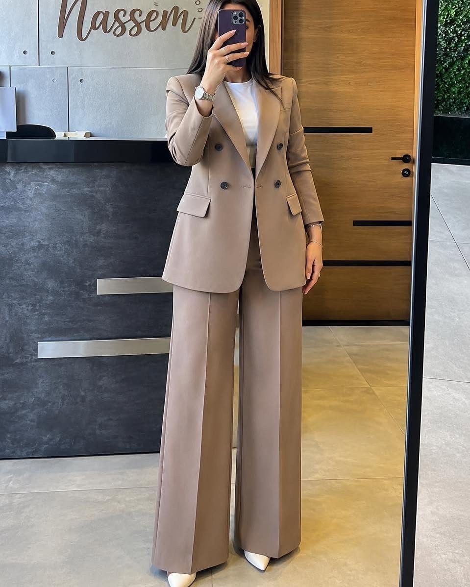 Casual Court Outfit for Women: 6 Ideas to Wear 3 Woman wearing a tan blazer and wide-leg trousers with a white top.