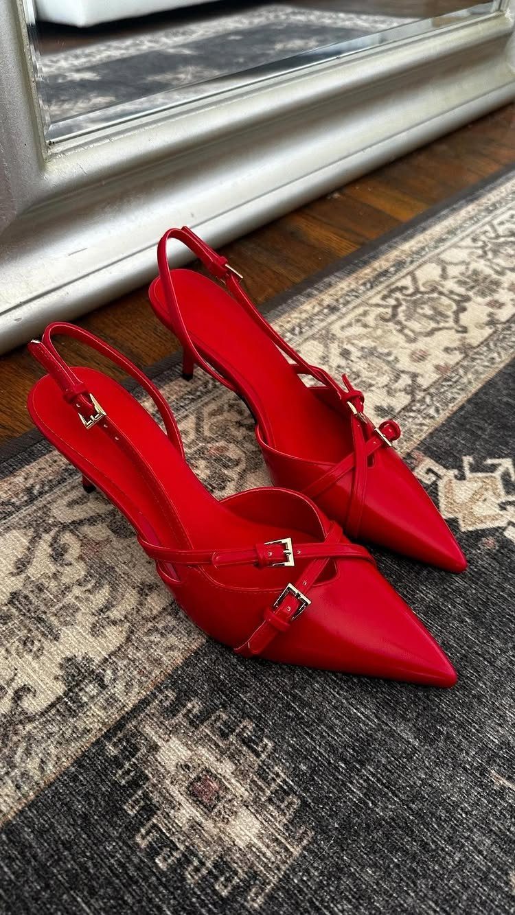 Cherry Red Kitten Heels: 6 Ideas from Straps to Buckles 1 Cherry red kitten heels with gold buckle adjustable straps on a patterned rug.