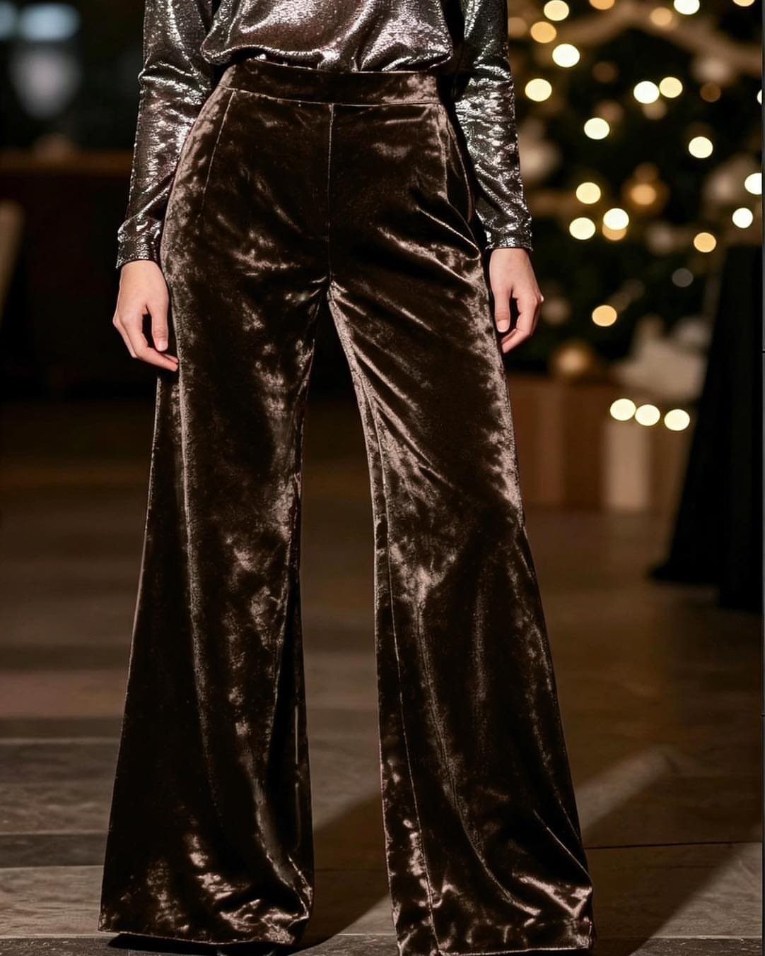 Christmas Outfit for Work: 13 Ideas to Wear to the Office 7 Wide-leg brown velvet trousers and silver metallic top in a festive indoor setting