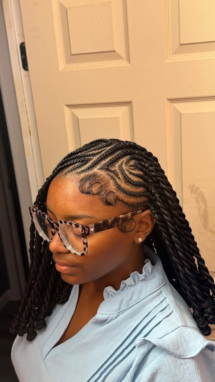 Cornrows and Twists Hairstyles: 11 Ideas to Try 9 Woman with curved cornrows transitioning into long black twists and tortoiseshell glasses.
