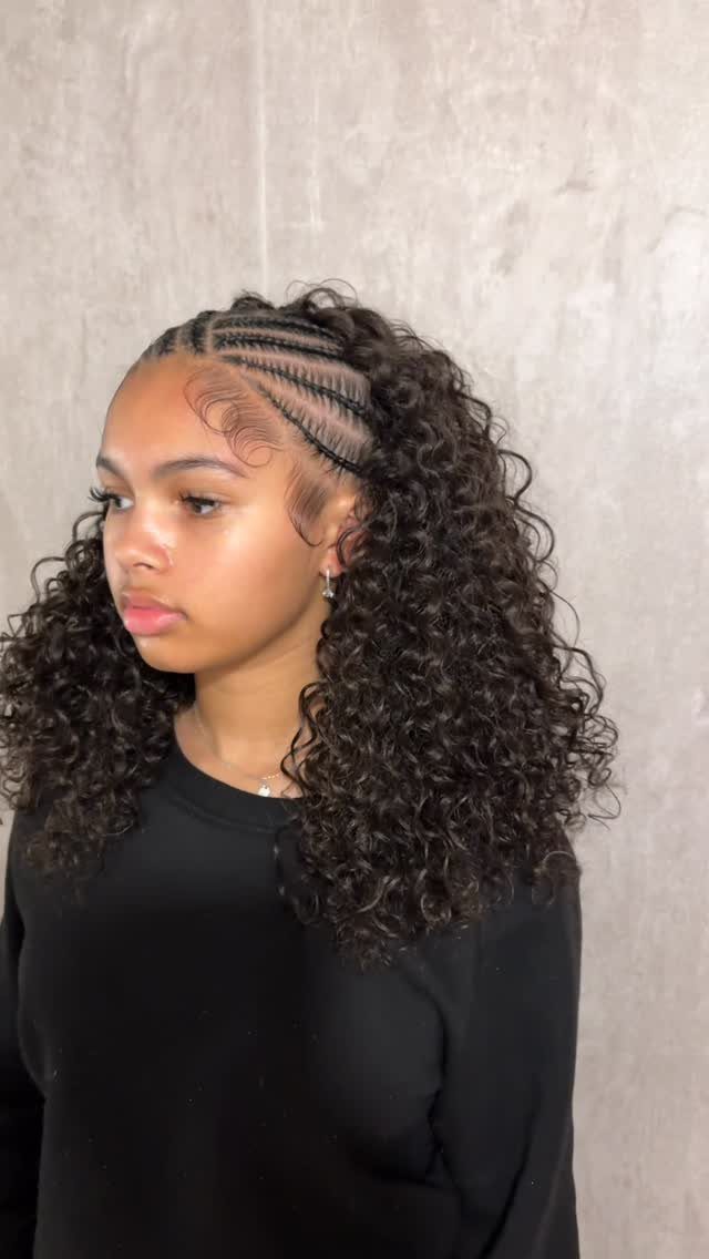 Cornrows and Twists Hairstyles: 11 Ideas to Try 7 Woman with cornrow braids on top and long curly hair flowing down