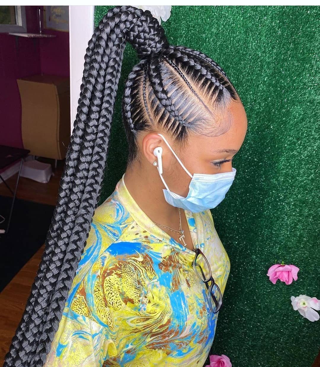 Cornrows and Twists Hairstyles: 11 Ideas to Try 1 Woman with cornrows styled into a high, long ponytail of black braids.