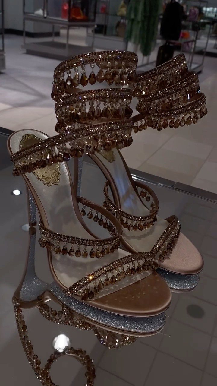 Crystal Embellished Heels: 5 Ideas for Brides and Beyond 5 Gold high-heeled sandals with multiple straps embellished with gold crystals and teardrop beads.