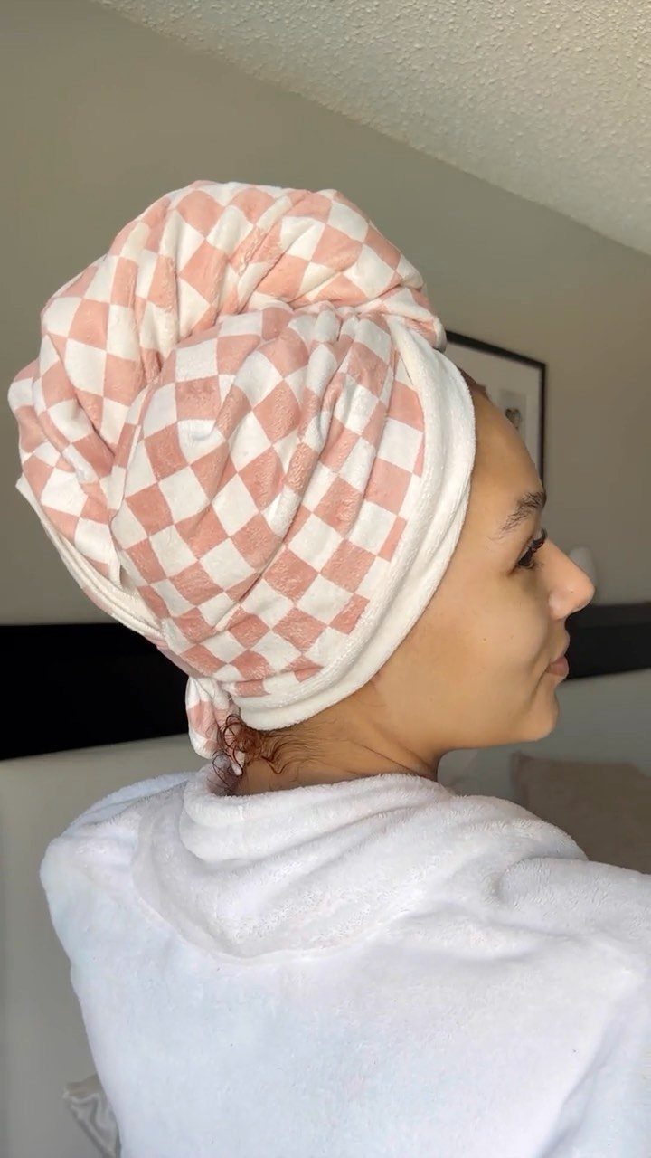 Hair Care at Home: 7 Ideas for Softer, Smoother Hair 2 Woman wearing a pink and white checkered microfiber towel wrapped around her hair.