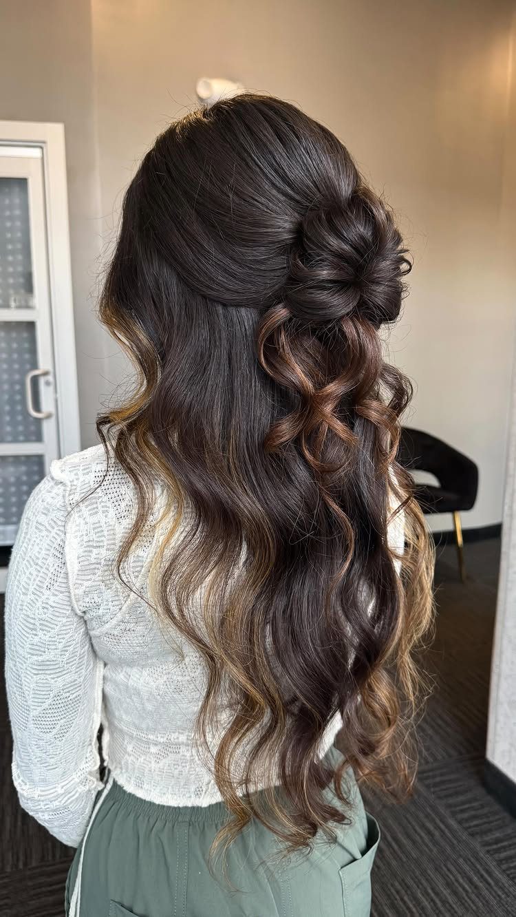 7 Hairstyles for Long Hair Down: Braids, Waves and Curls 6 Long wavy brown hair with blonde highlights styled in a half-up downdo.