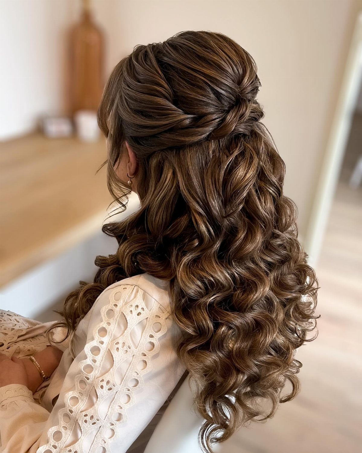 14 Hairstyles for Long Hair for Summer, Easy and Cool 8 Long curly brown hair styled in a boho half-up twisted hairstyle with curls.