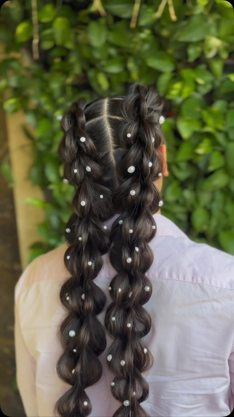 14 Hairstyles for Long Hair for Summer, Easy and Cool 11 Two bubble braids with white pearl beads on long dark hair.