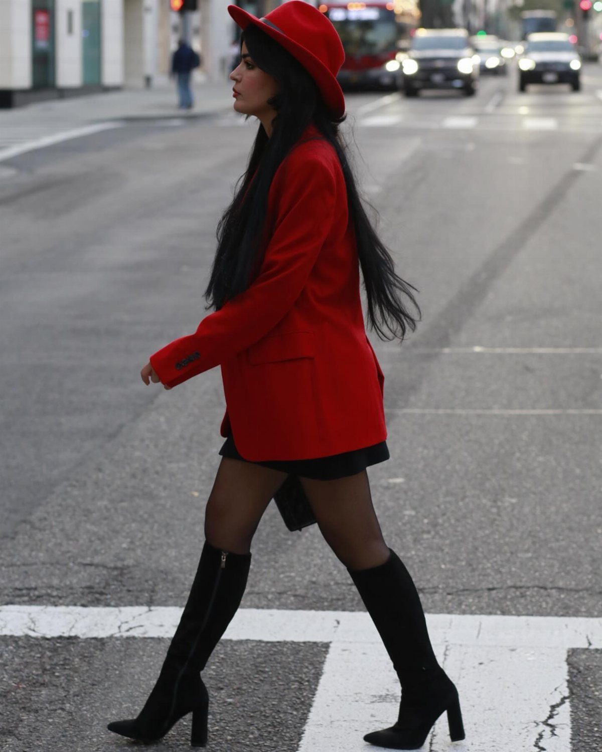 High Cut Boots: 13 Ideas from Kitten Heels to Thigh-High 7 Woman in red blazer and hat wearing black knee-high block heel boots.
