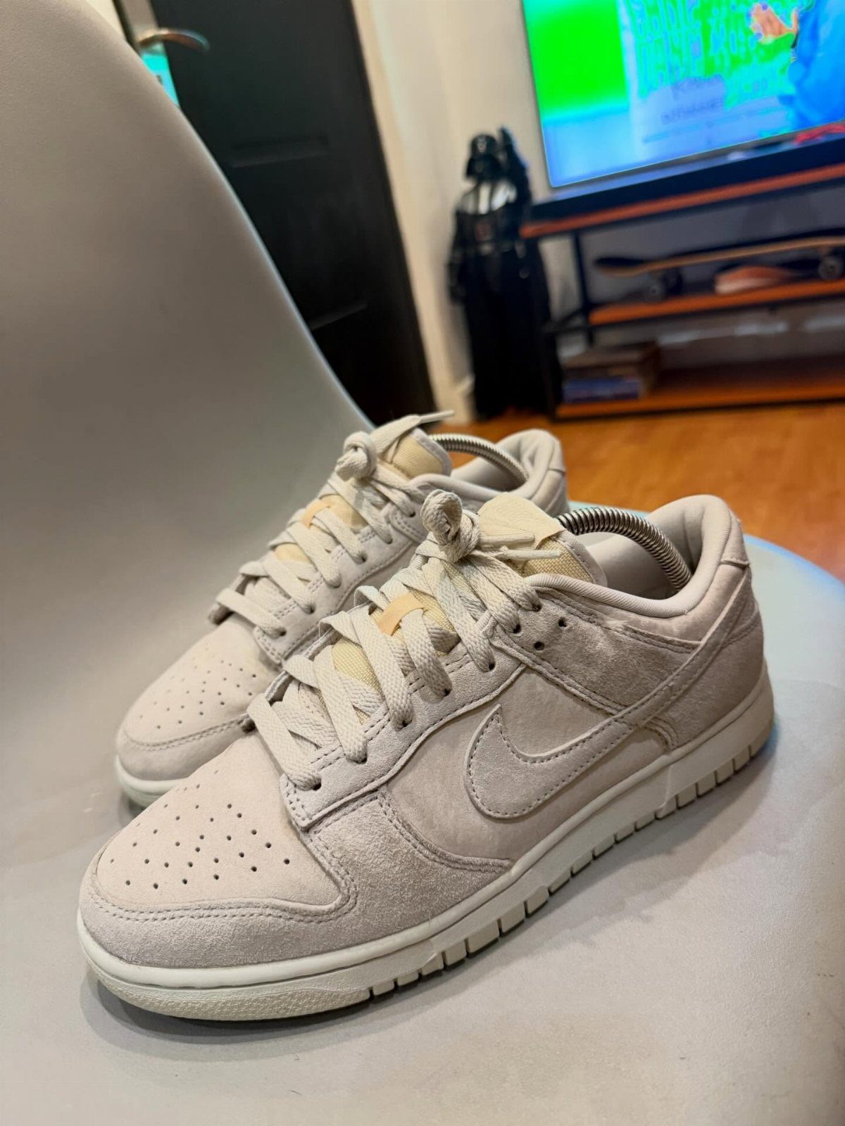 Light Grey Dunks: 5 Ideas, From Smoke Grey to Gum Soles 3 Light grey suede Nike Dunk Low sneakers resting on a grey surface.