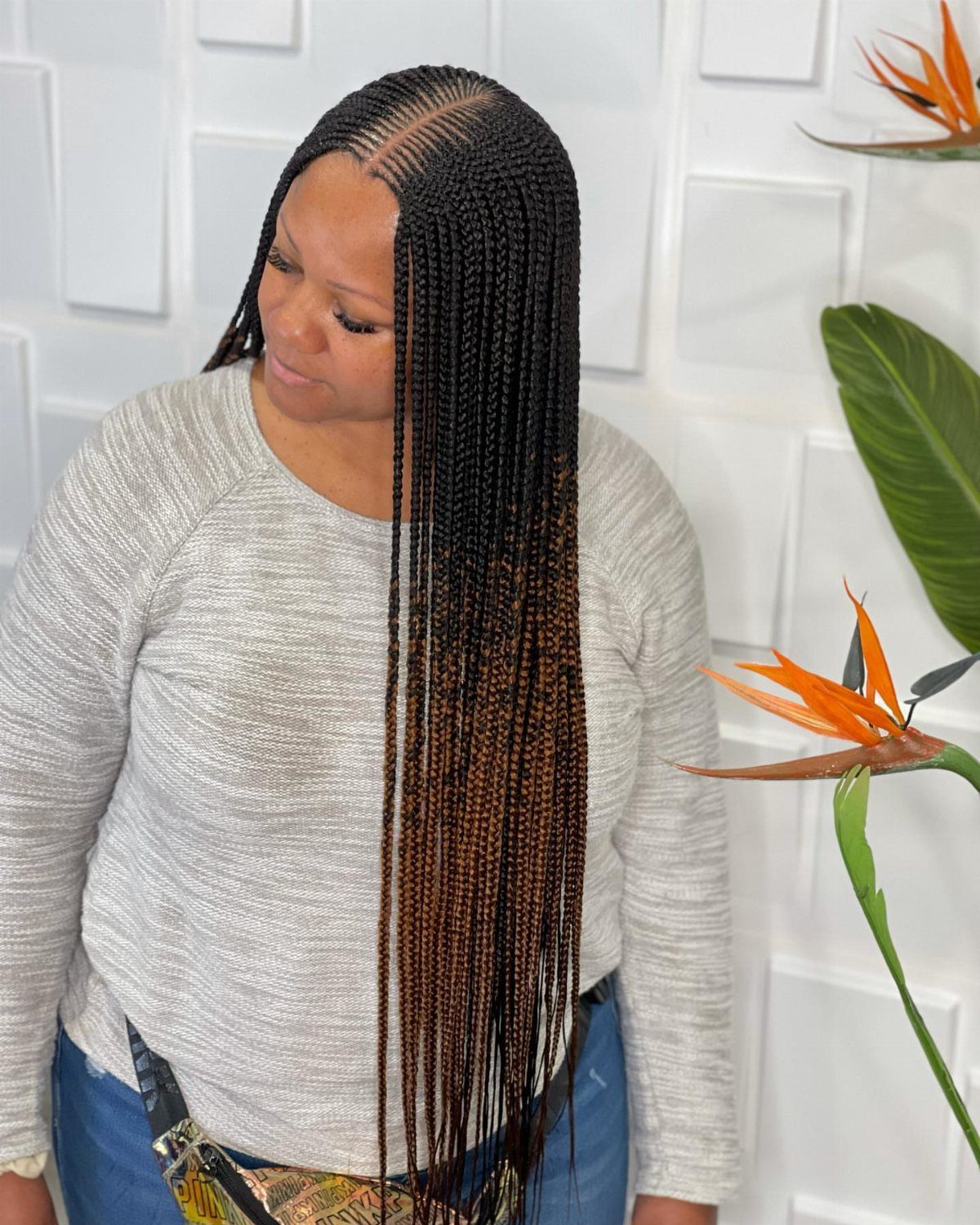 5 Middle Part Tribal Braids with Beads, Curls and More 4 Woman with long middle part tribal braids in black and brown ombre colors.