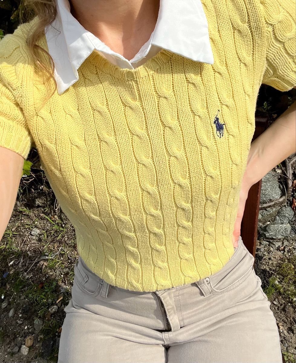 Ralph Lauren Yellow Polo Outfits: 6 Ways to Wear One 4 Yellow cable-knit polo shirt with white collar and beige trousers outdoors.