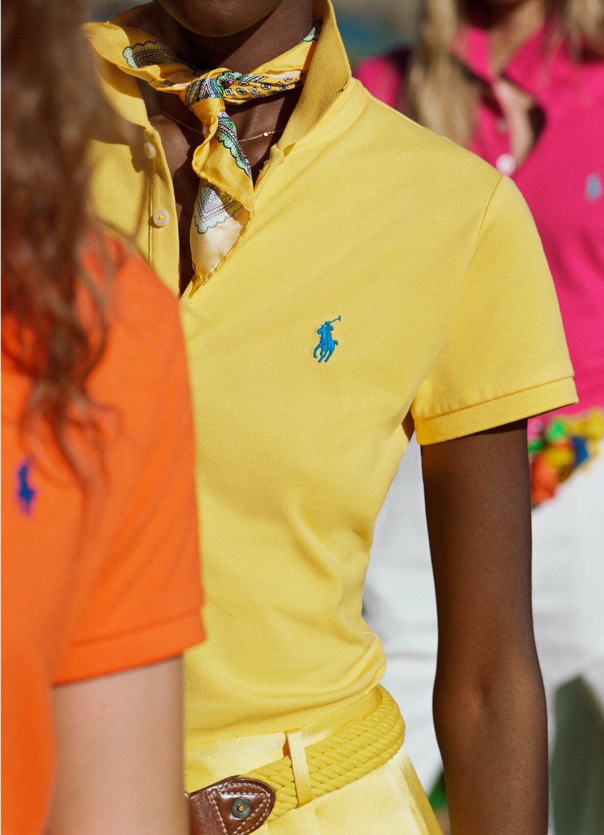 Ralph Lauren Yellow Polo Outfits: 6 Ways to Wear One 3 Yellow polo shirt with a patterned neck scarf and yellow braided belt