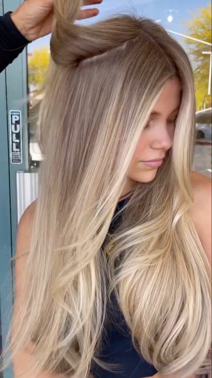 20 Summer Hair Dye Ideas, from Pastel Blue to Cool Raven 19 Woman with long wavy hair in a blend of creamy blonde and light brown